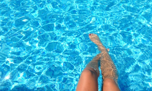 a person sitting in a pool