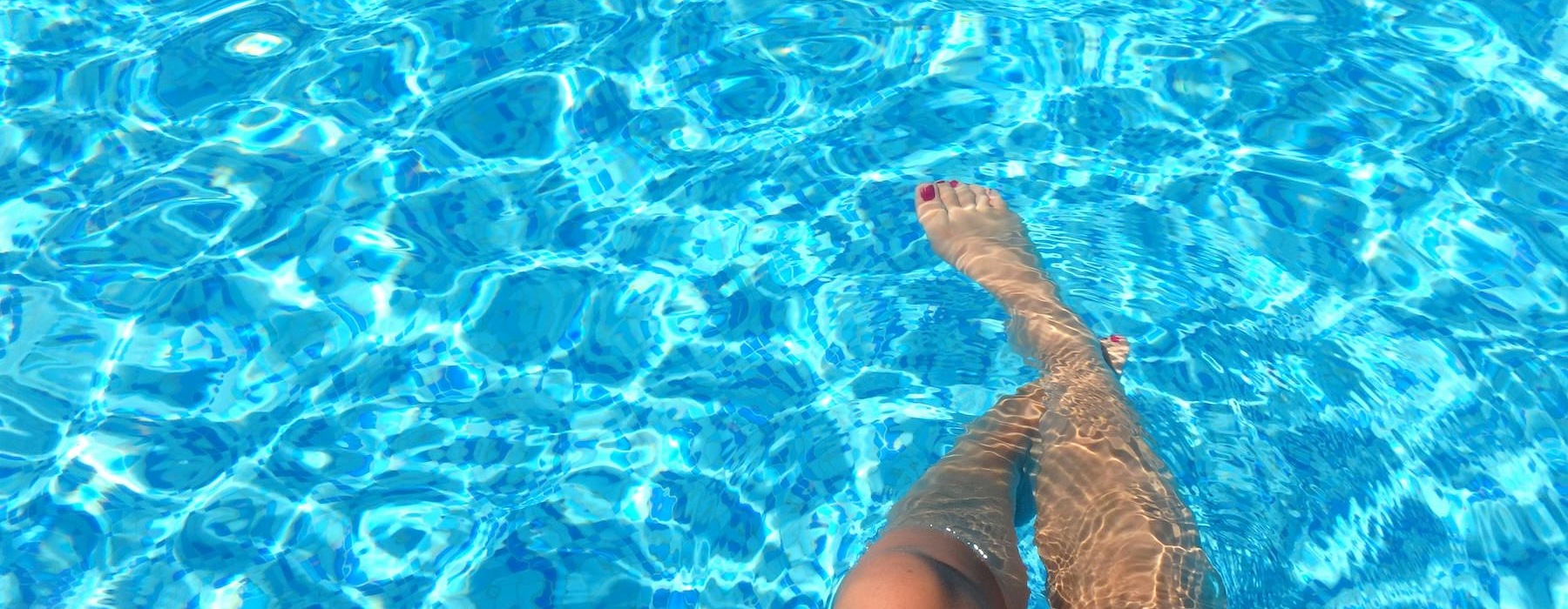 a person sitting in a pool