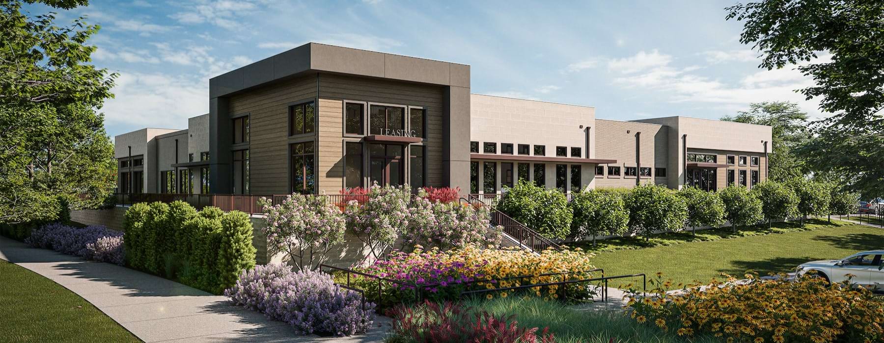 a building with a garden in front