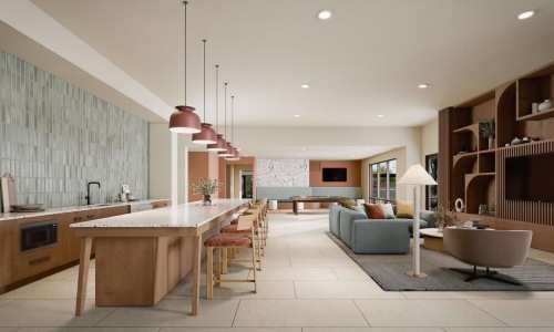 a clubroom with a table, chairs and a couch